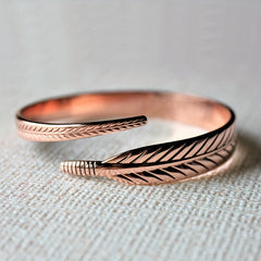 Copper Bangle With Feather Accents - Stylish and Versatile Jewelry Piece