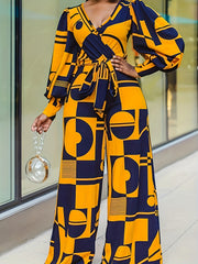 Plus Geometric Print Lantern Sleeve Surplice Neck Wide Leg Jumpsuit