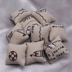 Nautical Pillow with Hand Drawn Maritime Designs - Light Brown