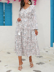  Allover Print Long Sleeve V Neck Maxi Dress With Tassel