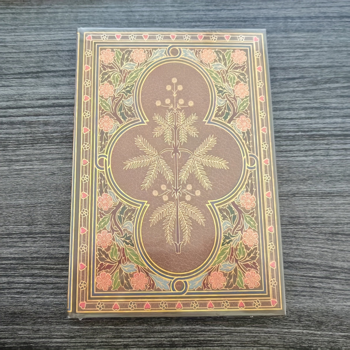 Vintage Botanical Notebook with Golden Butterfly Motif and Green Foliage