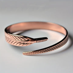 Copper Bangle With Feather Accents - Stylish and Versatile Jewelry Piece