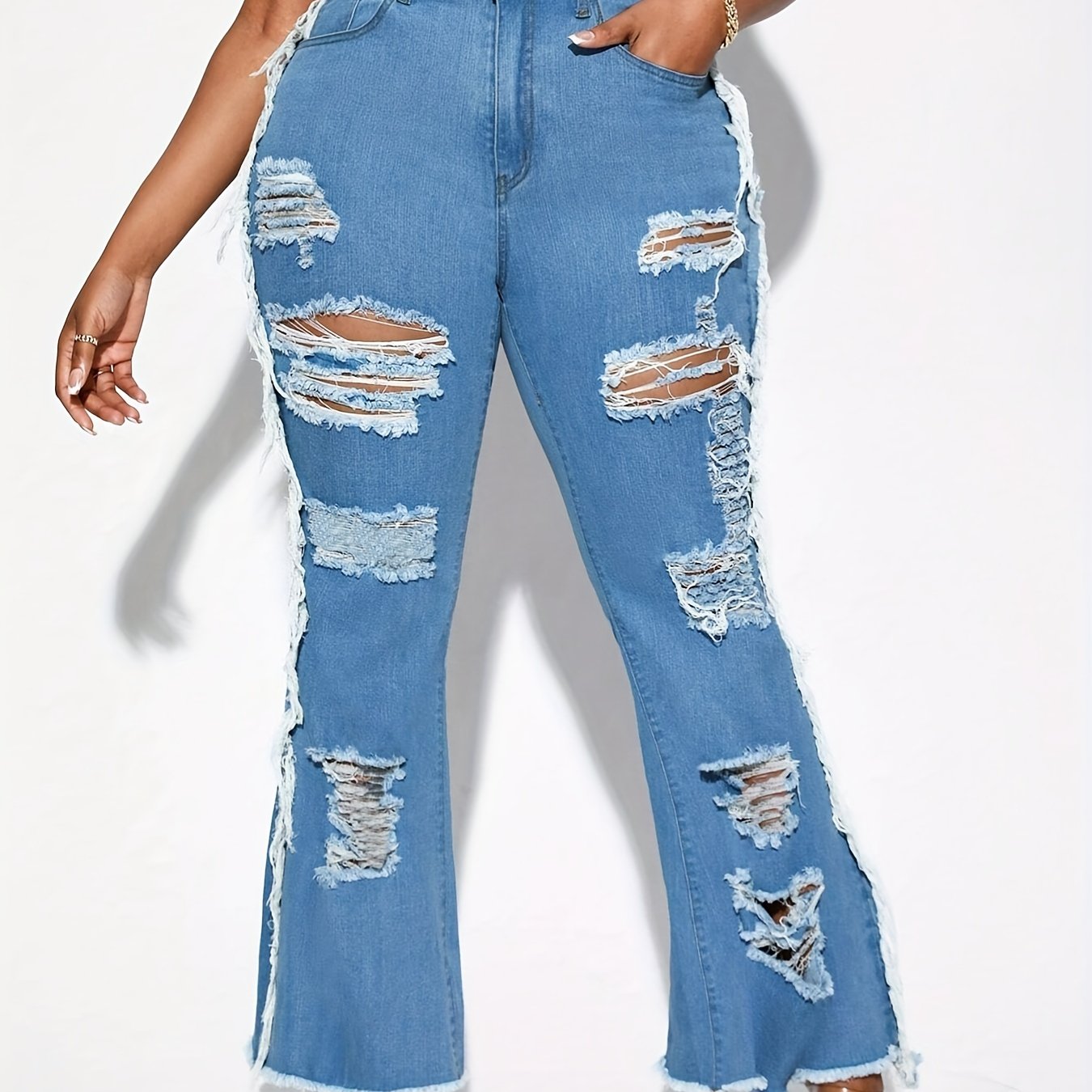  Ripped Fringe Trim Flared Leg Jeans