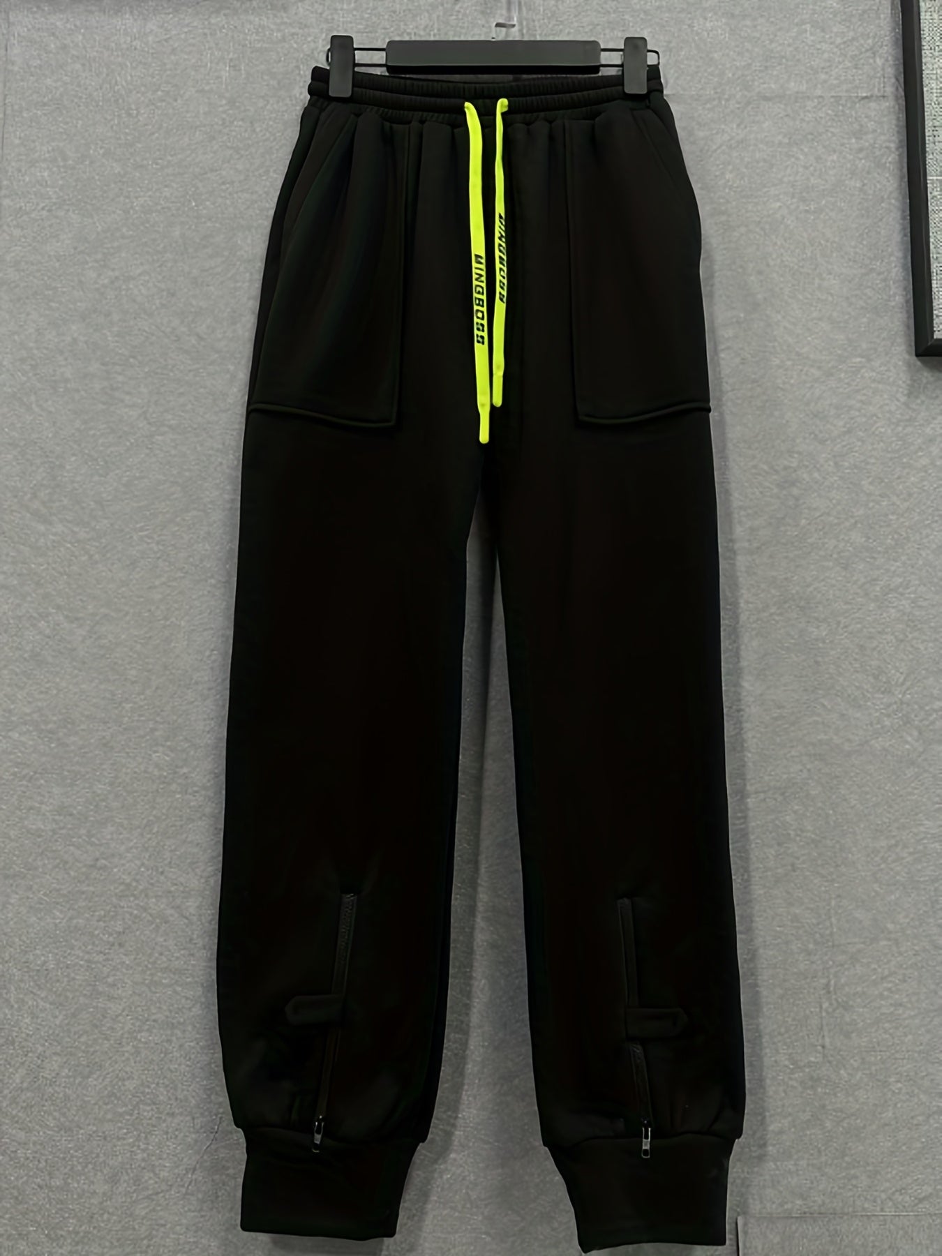  Solid Elastic Drawstring Tapered Leg Pants With Pockets