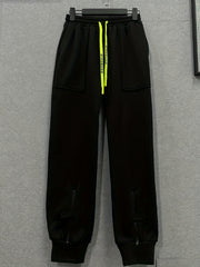  Solid Elastic Drawstring Tapered Leg Pants With Pockets