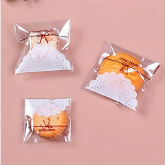 100pcs Transparent Lace Bowknot Cookie Plastic Candy Bags