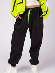  Solid Elastic Drawstring Tapered Leg Pants With Pockets