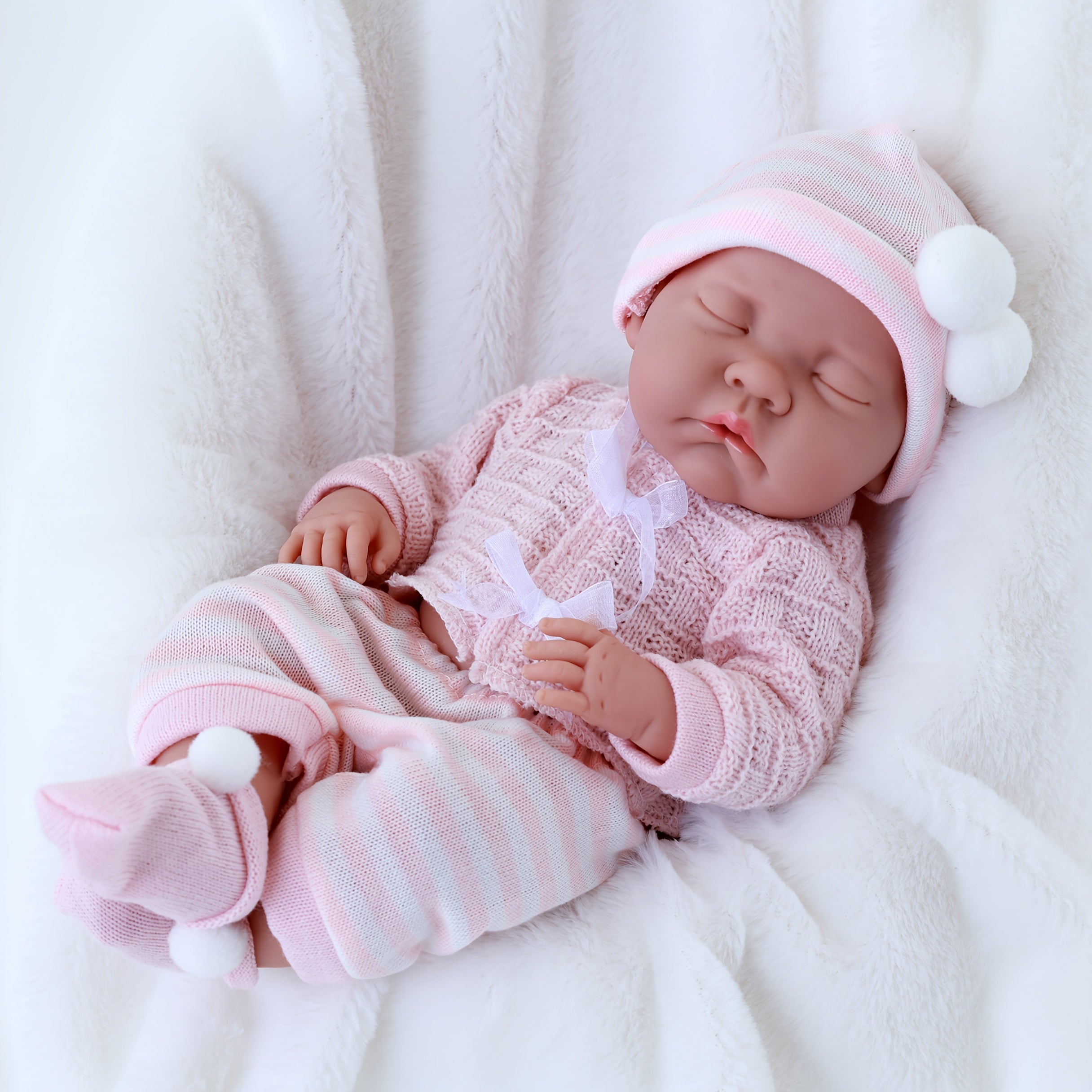 Realistic Reborn Baby Doll in Sleeping Pose with Pink Bunny Outfit