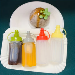 4Pcs Mini Squeeze Bottles Refillable Condiment Dispenser with Flip Top