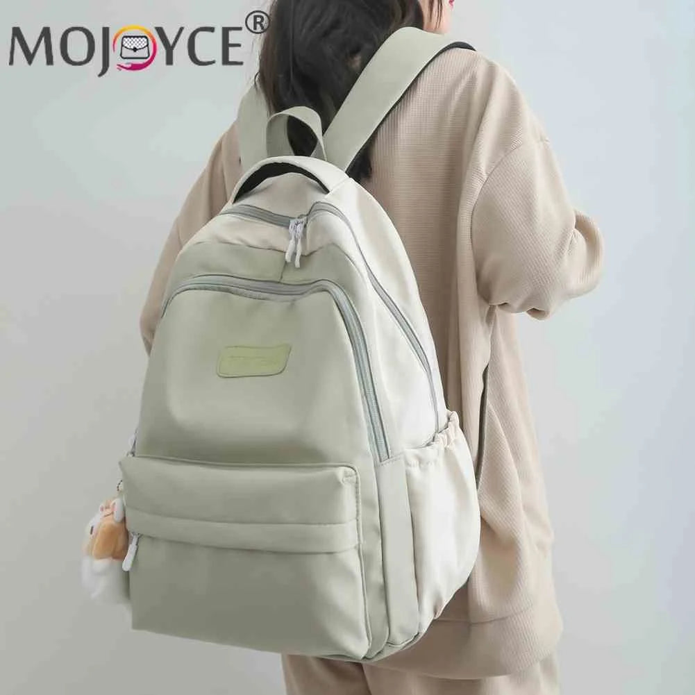 Fashionable Large Capacity Nylon Women's Backpack with Plush Pendant
